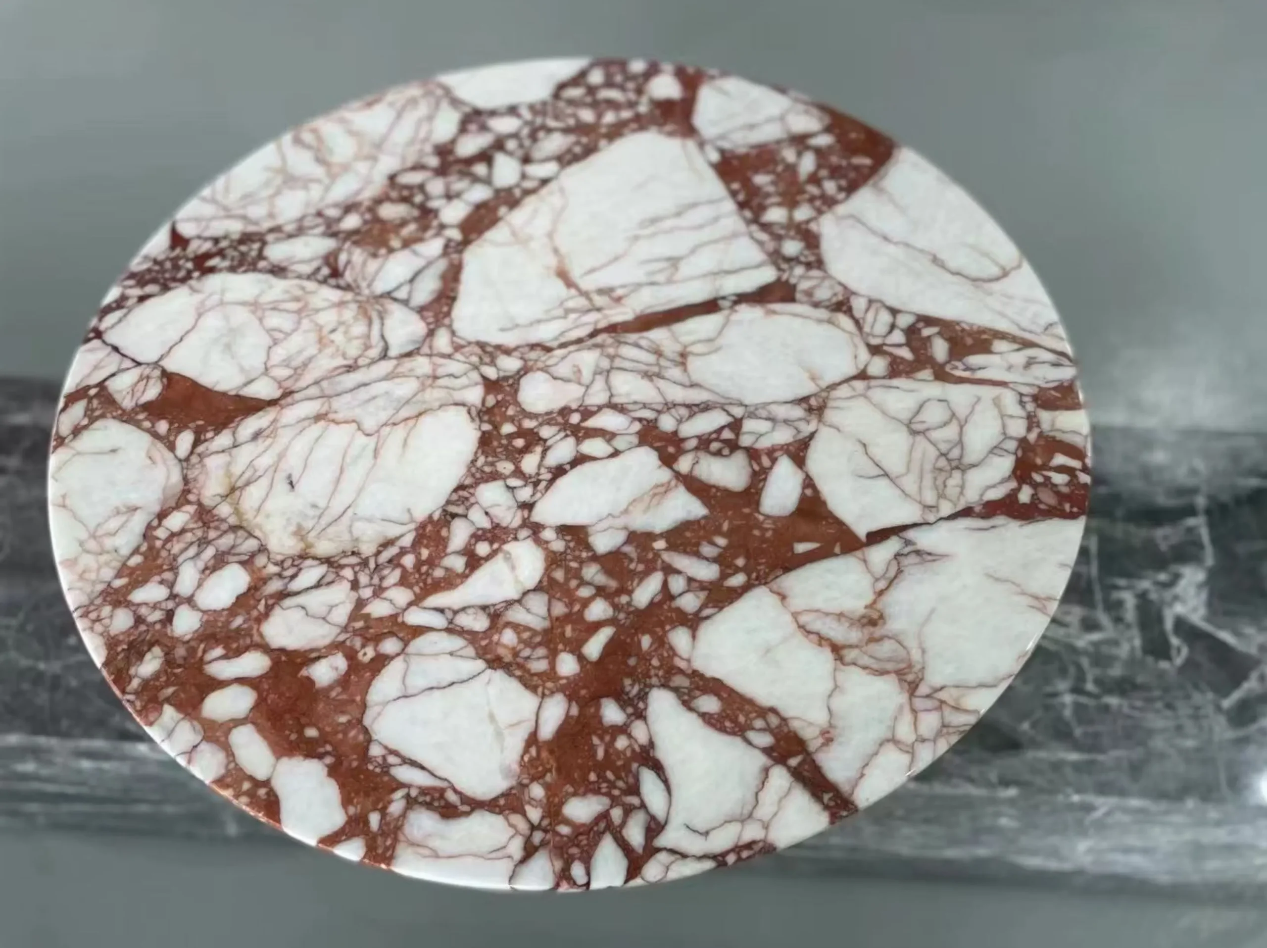burberry-pink-marble-round-table-top-detail-02.webp burberry pink marble round table top detail with warm red veining