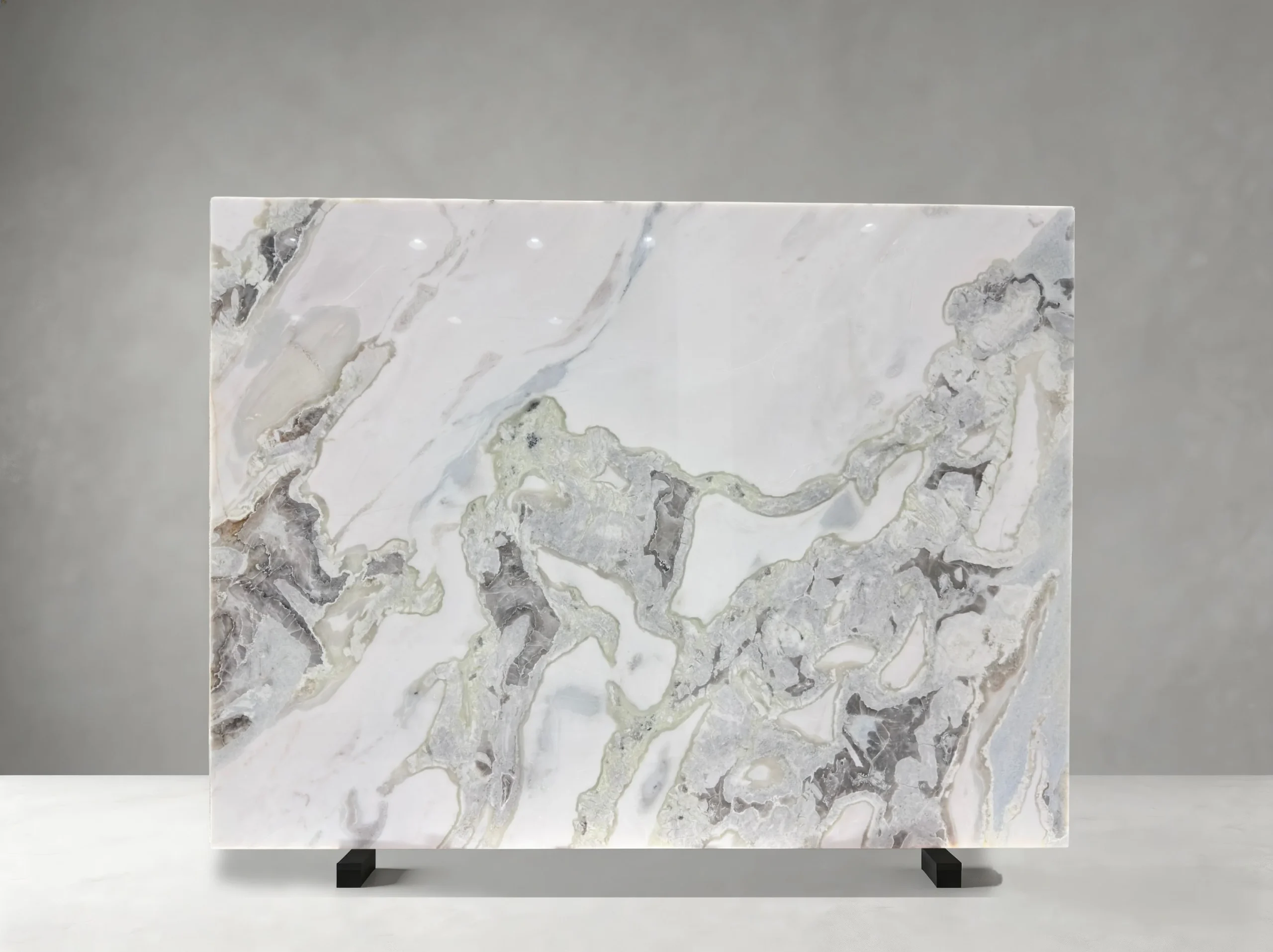 caribbean-island-marble-slab-pale-green-mineral-movement-05.webp caribbean island marble slab with pale green mineral movement for custom stone projects