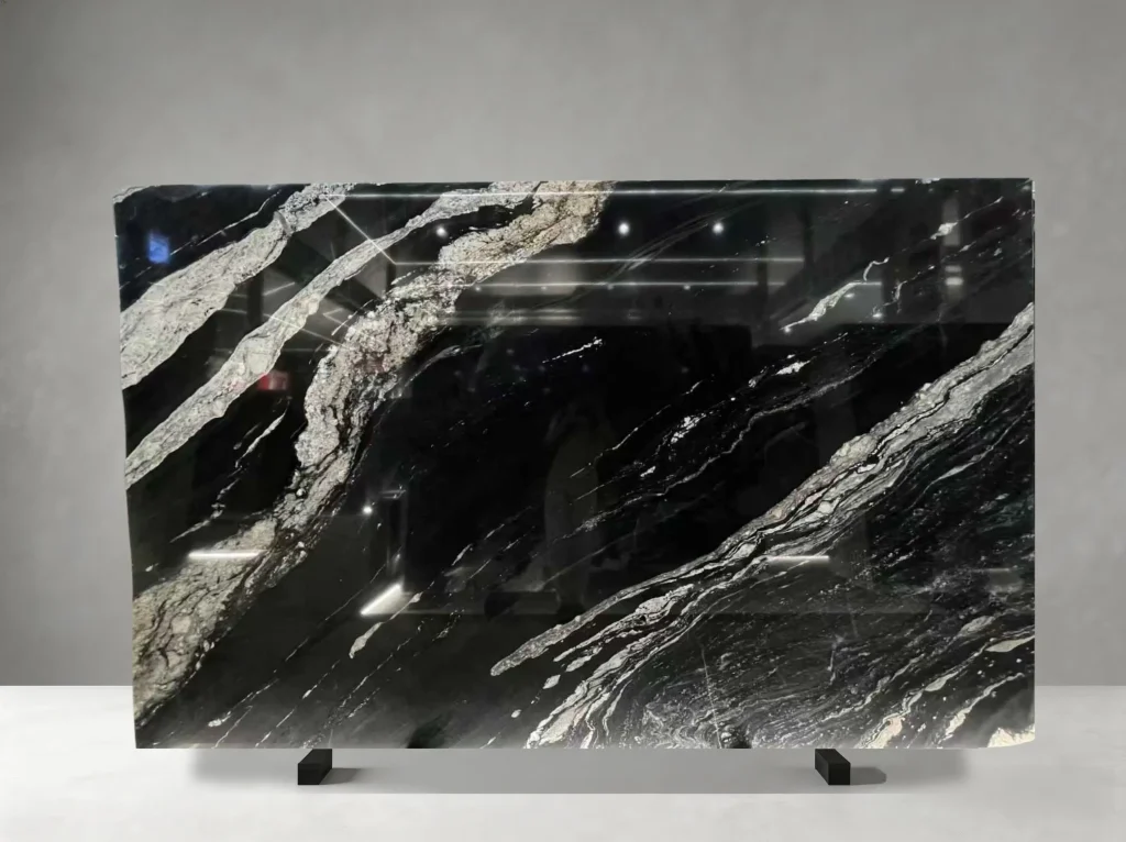 cosmic black titanium granite slab with white mineral bands for walls and island tops