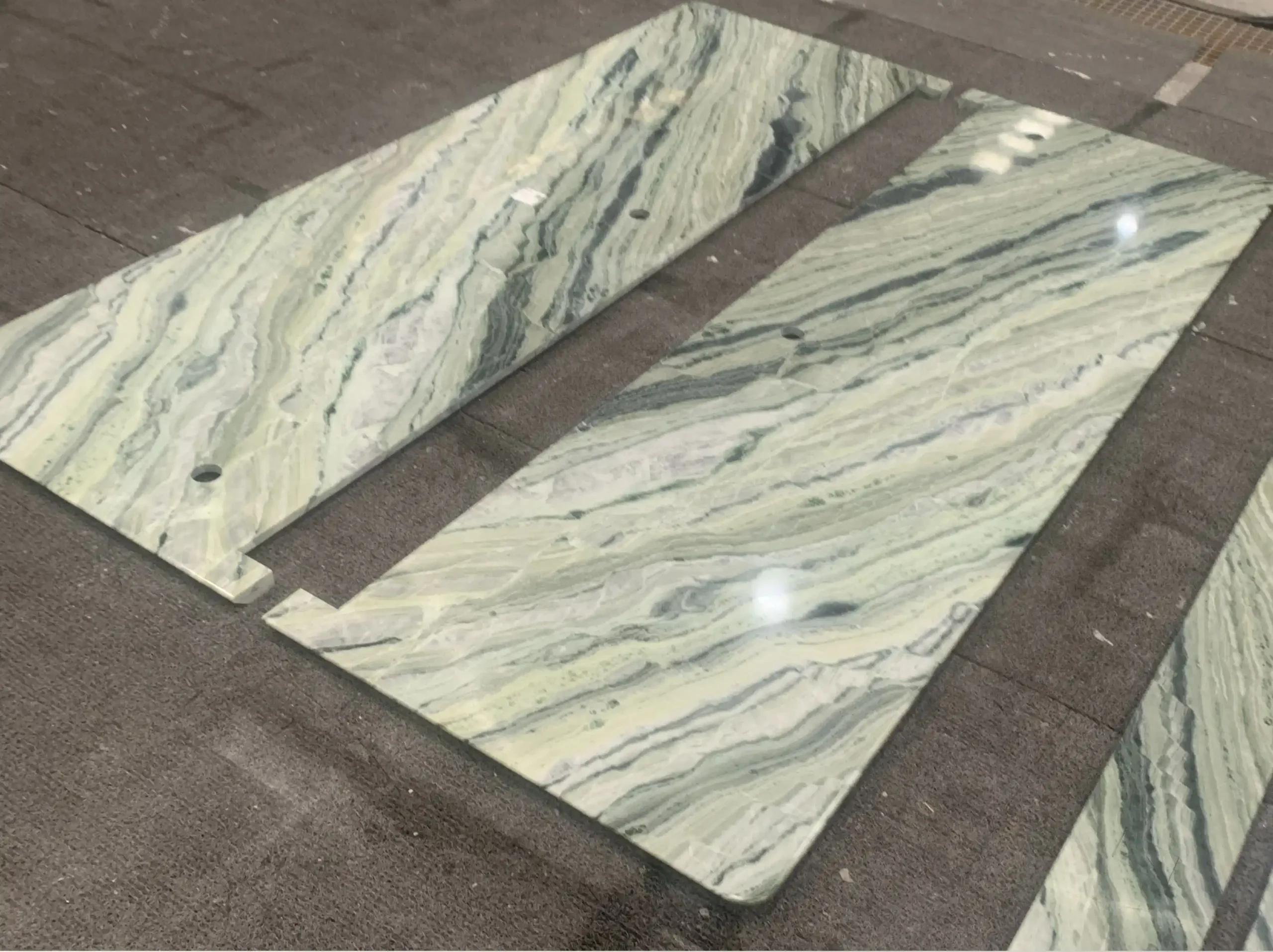 river-jade-marble-cut-to-size-panels-01.webp river jade marble cut to size panels with soft green and grey veins