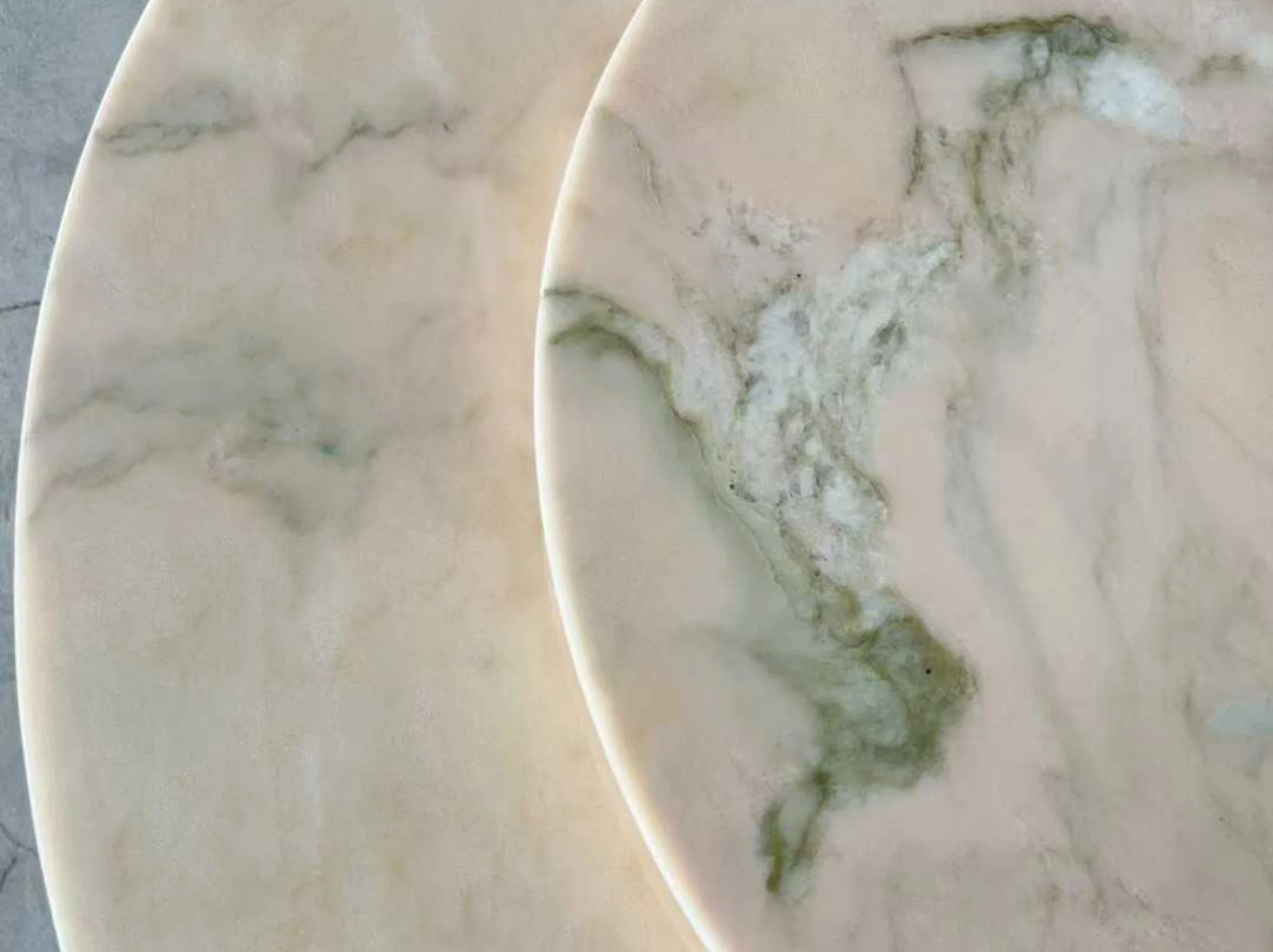 rosa-portugal-marble-round-tabletop-detail.webp Close-up of Rosa Portugal Marble round table top with polished surface and natural veining