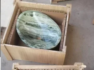 shangri-la emerald marble oval sink packed in export wooden crate