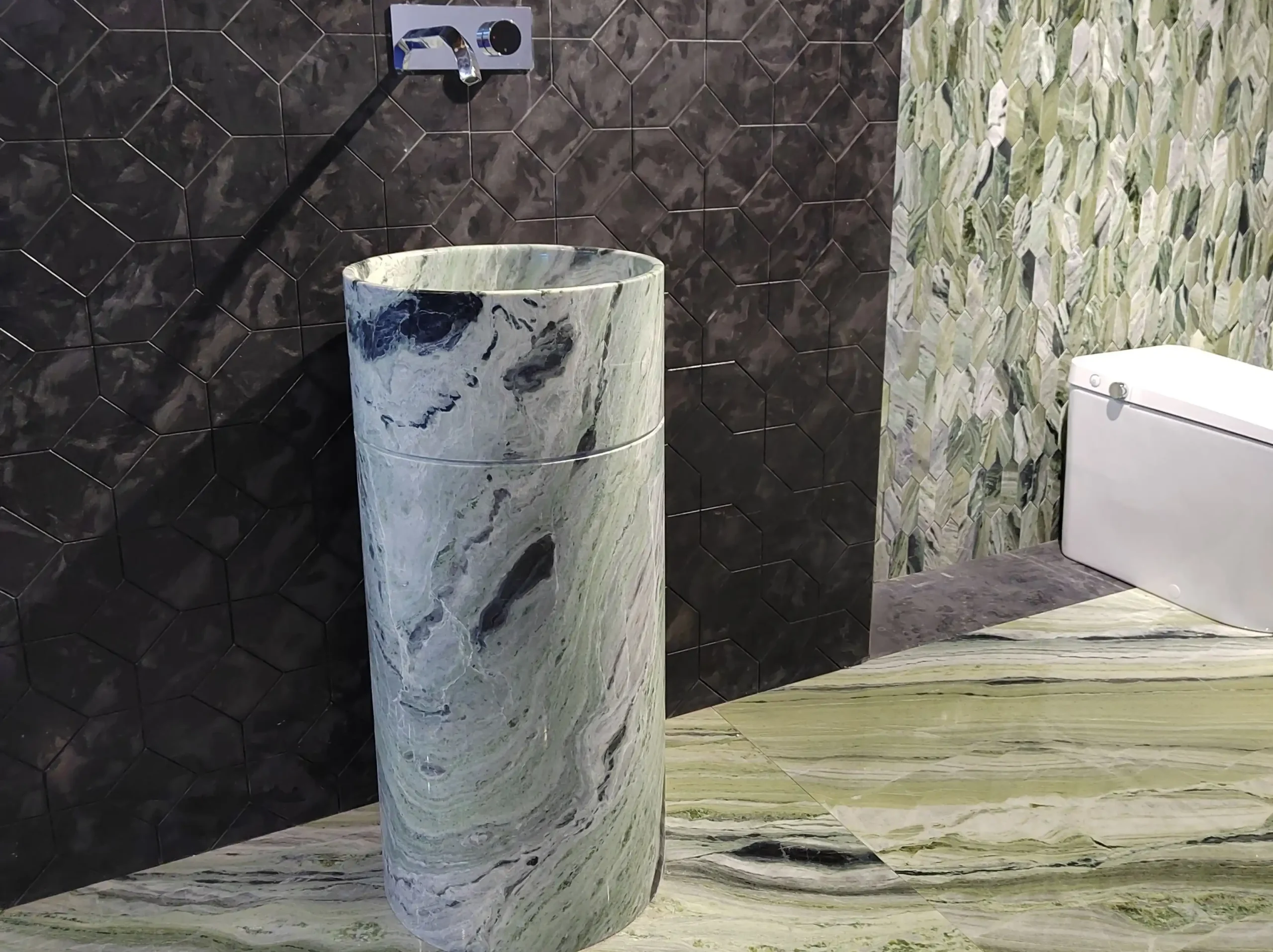 shangri-la-jade-marble-bathroom-sink-wall-tile-01.webp shangri la jade marble bathroom sink with matching wall and floor tiles