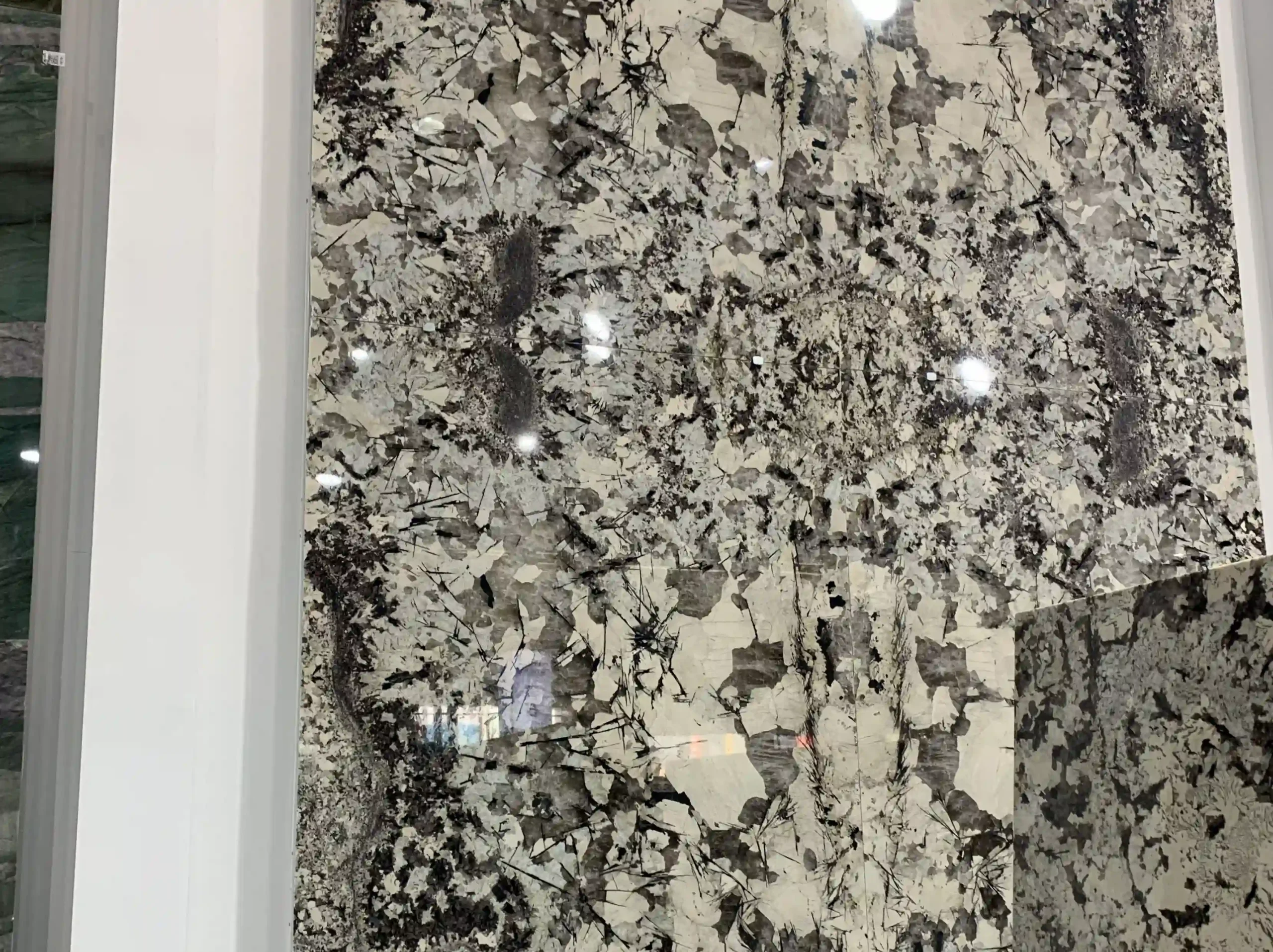 silver-fox-granite-polished-slab-crystal-texture-02.webp silver fox granite polished slab crystal texture for custom interiors