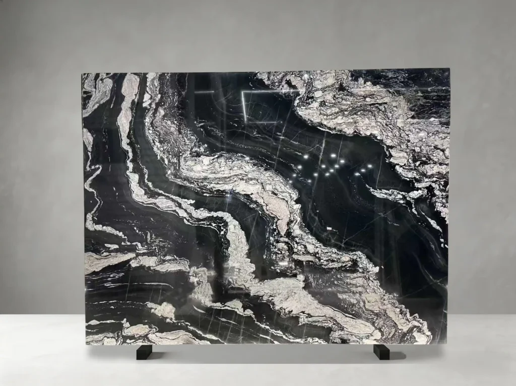 titanium black granite slab with flowing white veins for walls and islands