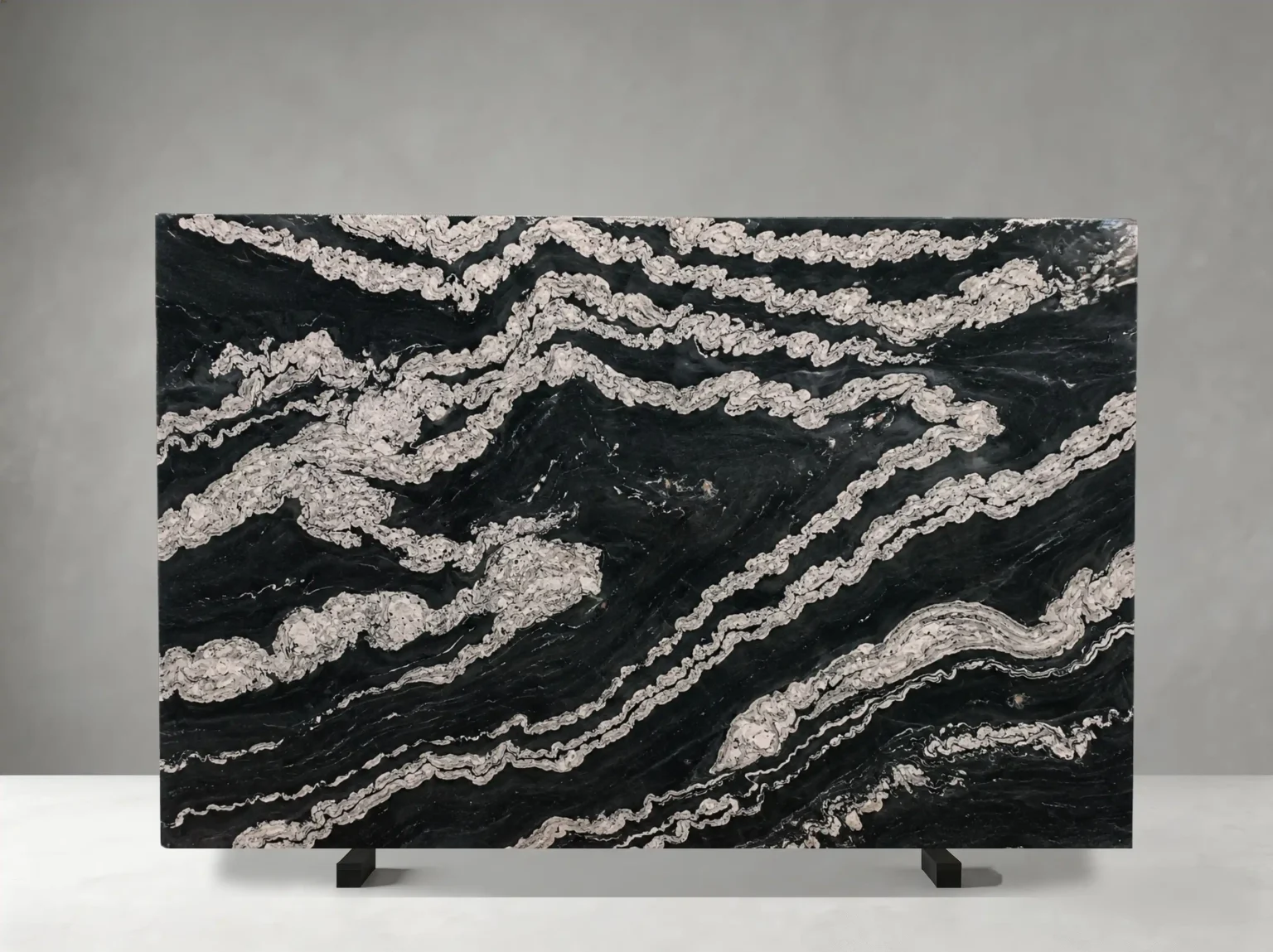 titanium granite slab with horizontal white mineral veins