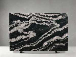 titanium granite slab with horizontal white mineral veins