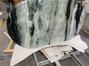 verde prato marble oval table top fabrication with green linear veins