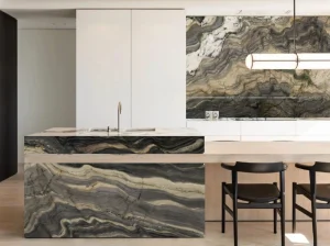 blue fusion quartzite kitchen island and backsplash with flowing wave texture