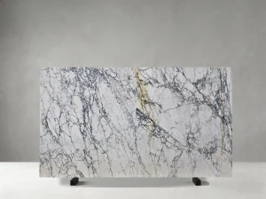 calacatta monet marble slab white artistic pattern with blue grey and gold veins