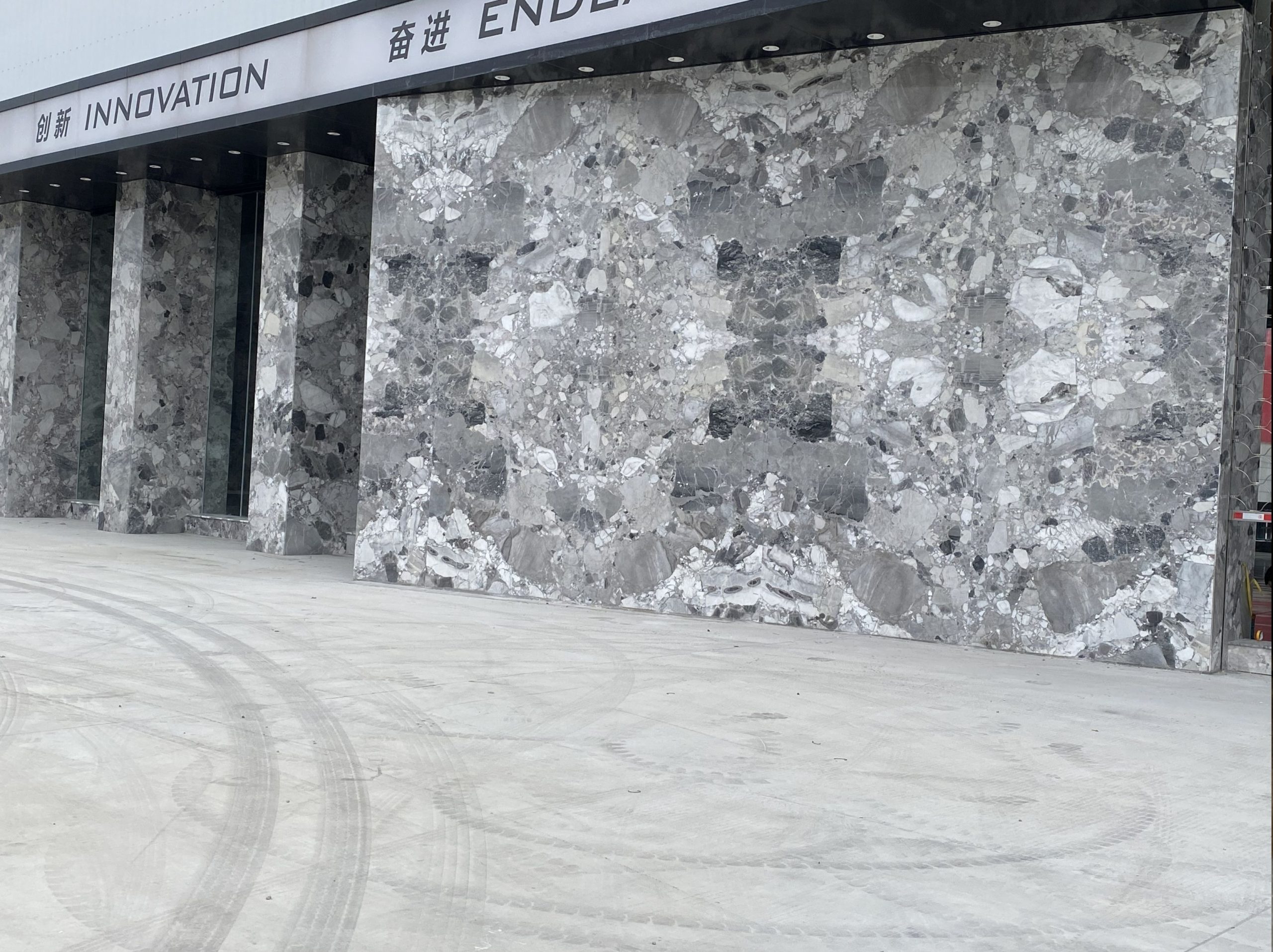 chinese-panda-grey-marble-exterior-facade-cladding-05.webp chinese panda grey marble exterior facade cladding with grey breccia pattern