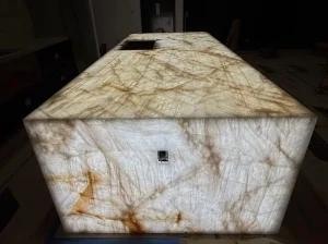 citrino crystal quartzite backlit counter with translucent white crystal and amber veins