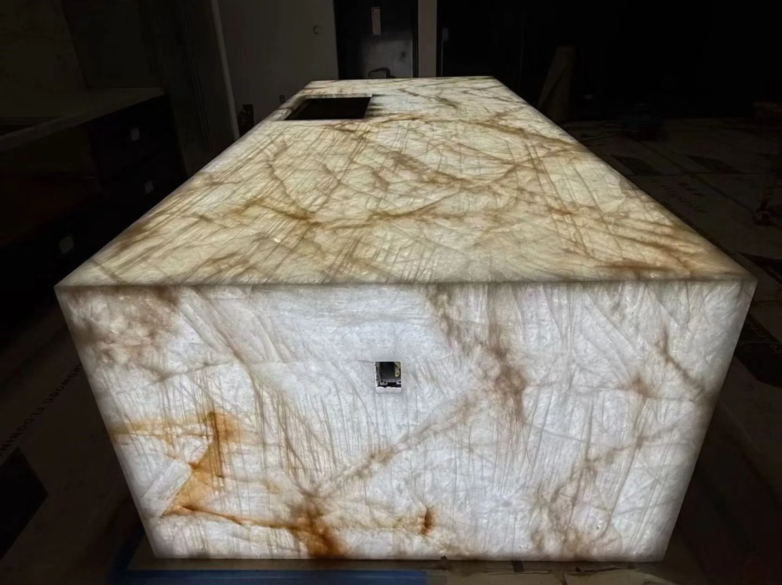 citrino-crystal-quartzite-backlit-counter-01.webp citrino crystal quartzite backlit counter with translucent white crystal and amber veins