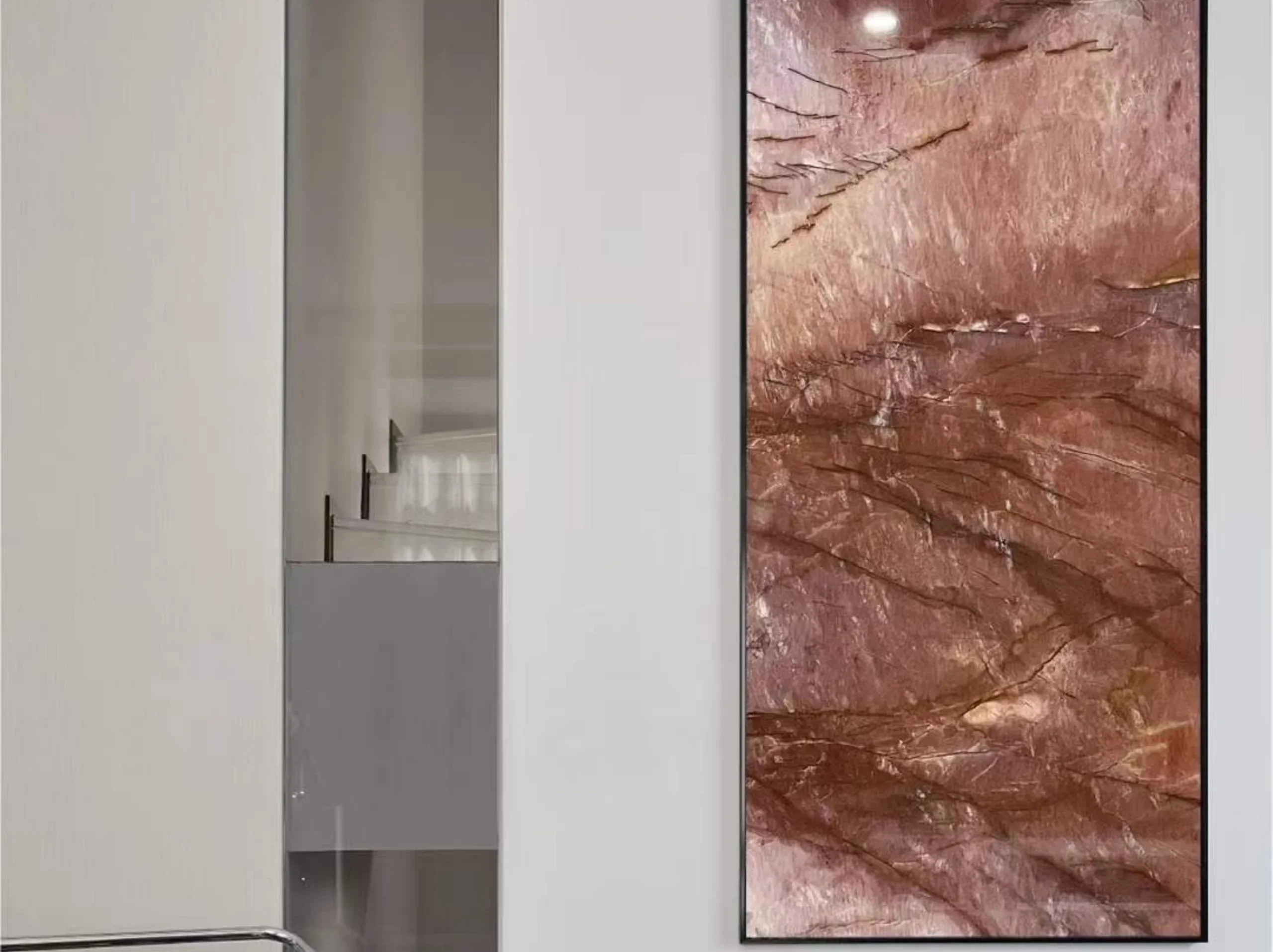 cosmopolitan-quartzite-living-room-feature-wall-02.webp cosmopolitan quartzite oval dining table top with rose copper veining