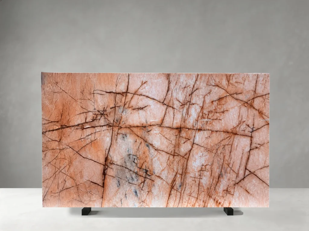 cosmopolitan quartzite slab soft peach veining for walls tables and island tops