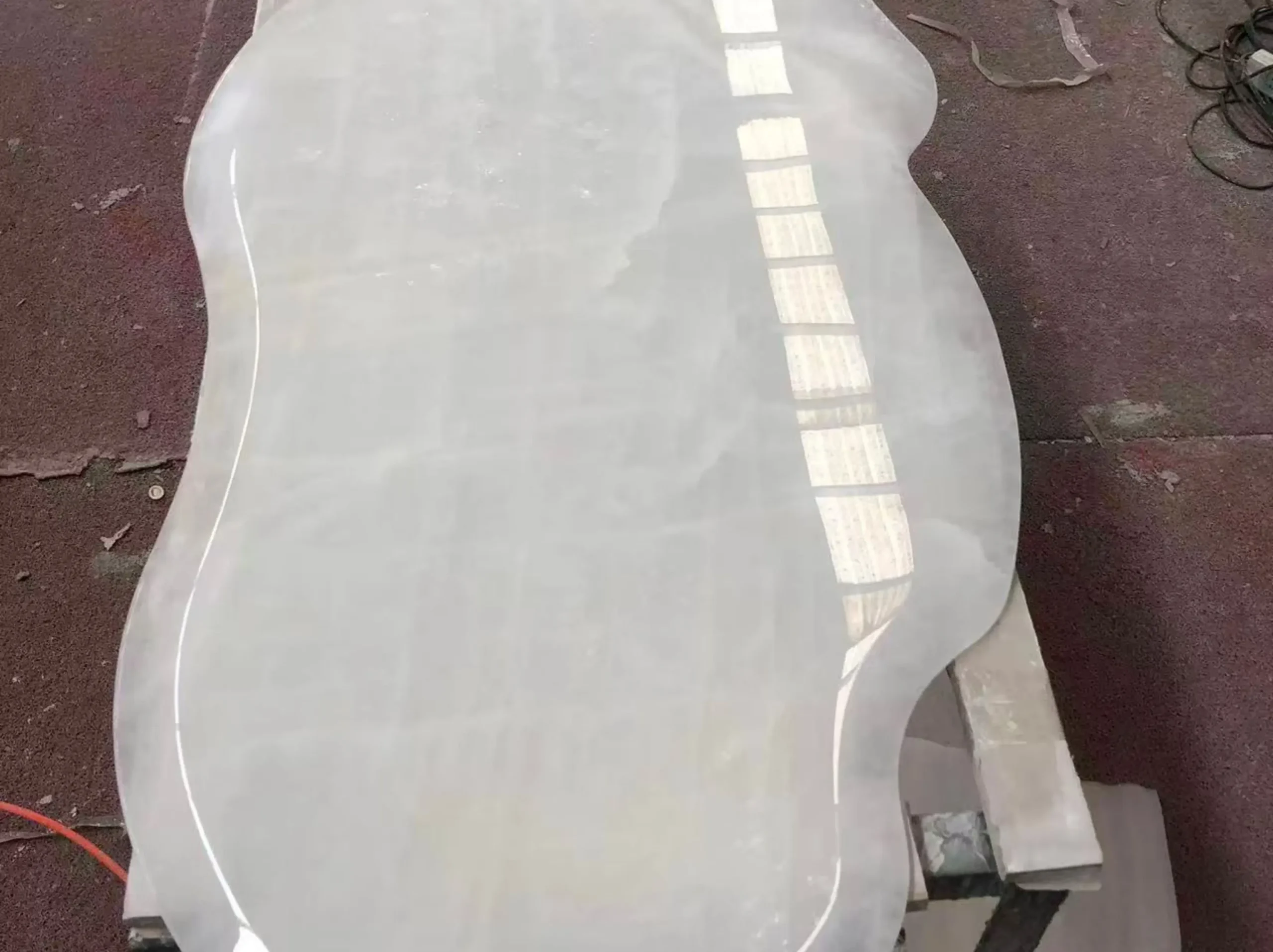 crystal-quartzite-custom-shaped-table-top-02.webp crystal quartzite custom shaped table top with polished translucent white surface