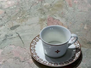 green breccia botticelli marble tabletop close up with pale green and pink natural texture