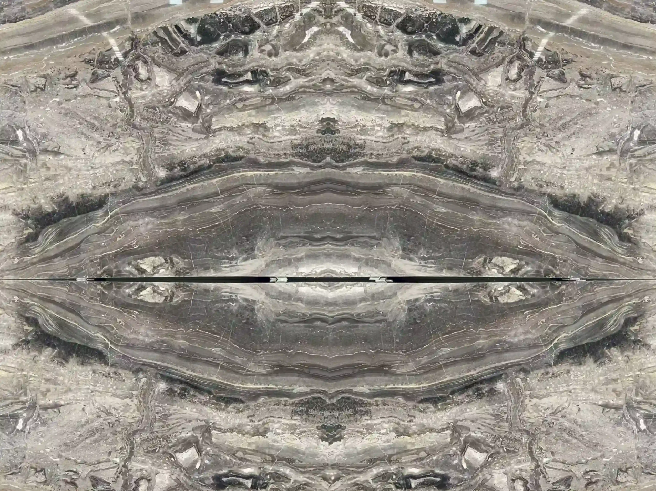 iride-nero-marble-bookmatched-wall-panel-03.webp iride nero marble bookmatched wall panel with grey black symmetrical pattern