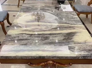marmo luano rosso marble tabletop application with dramatic veining