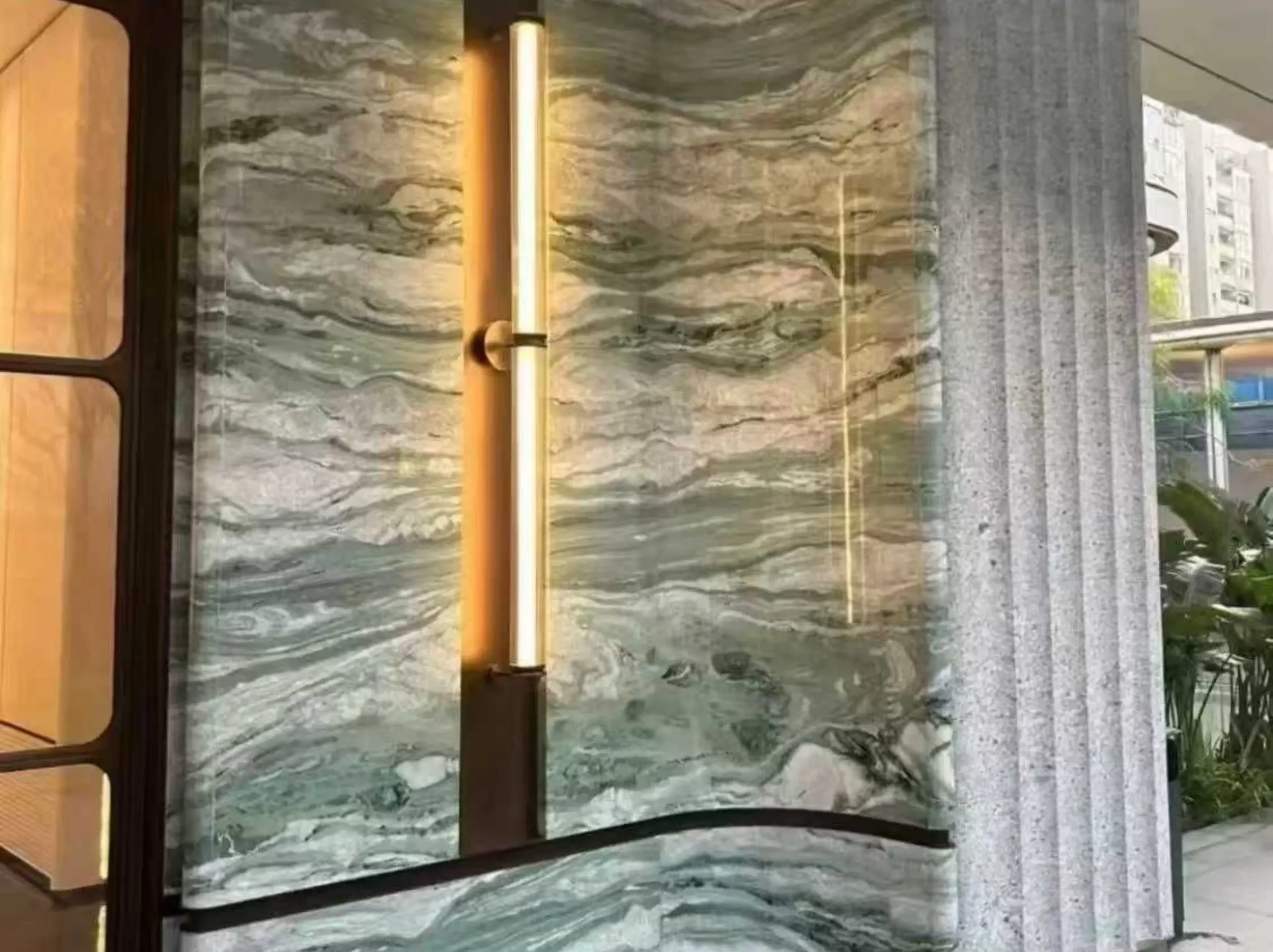 verde-vivo-quartzite-curved-wall-cladding-01.webp verde vivo quartzite curved wall cladding with soft green layered veining