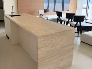 Afghan Travertine kitchen island with waterfall end panels and integrated sink