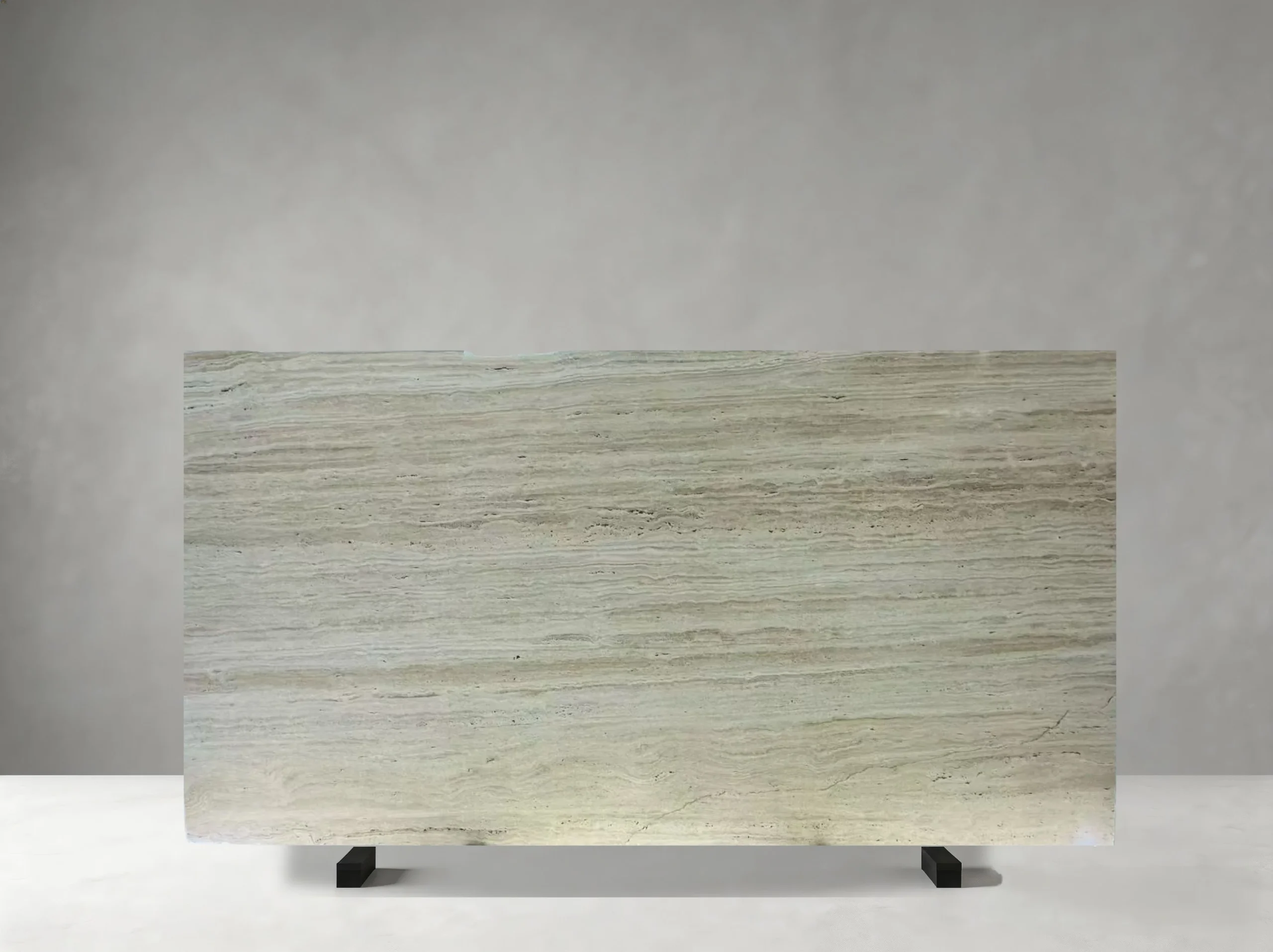 afghan-travertine-light-grey-linear-slab.webp Afghan Travertine slab with light grey beige tones and horizontal linear veining