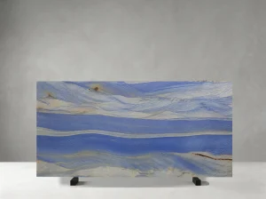 Azul Imperial Quartzite slab with layered blue and pale grey bandsv