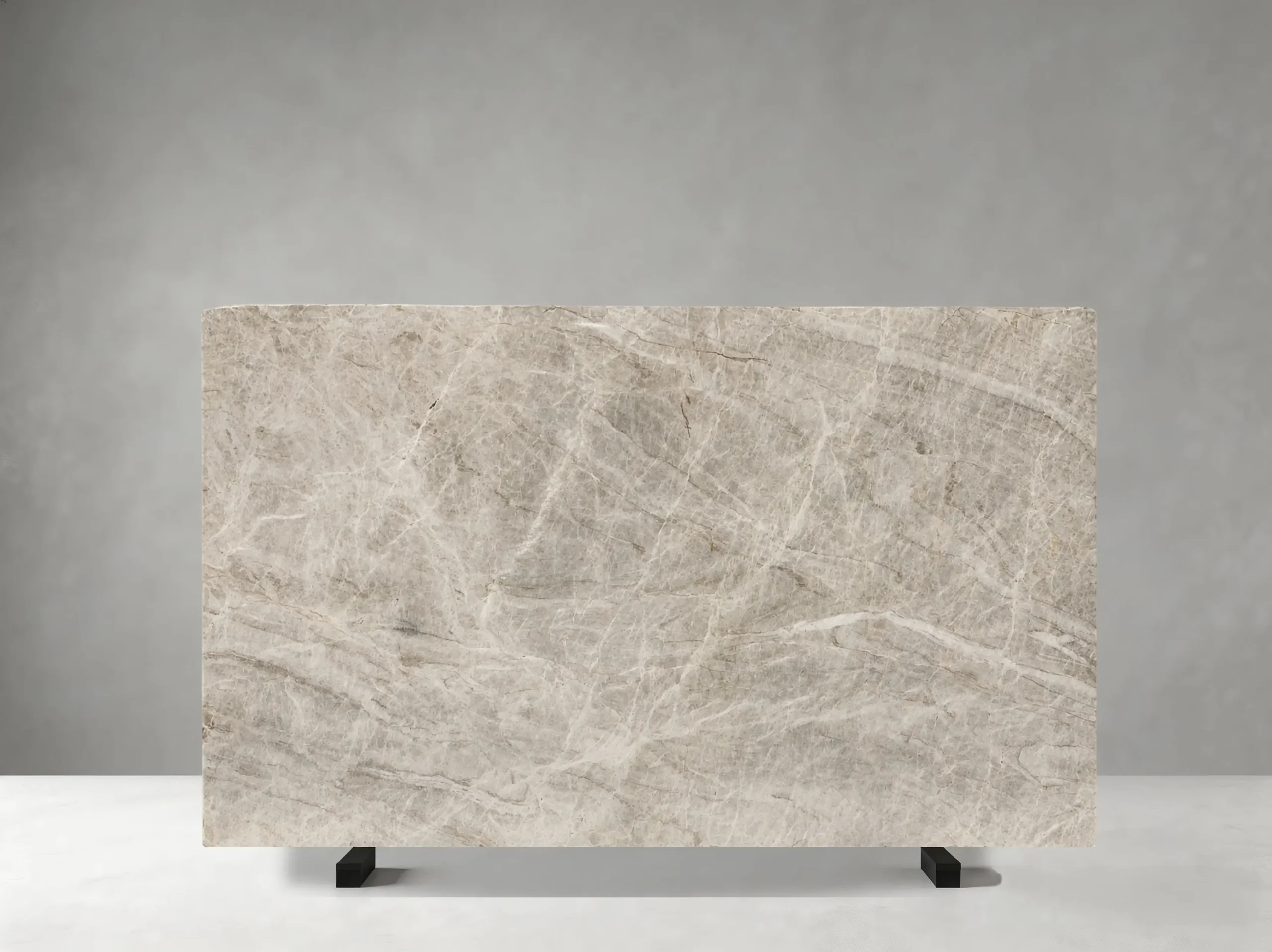 beige-taj-mahal-quartzite-slab-selection.webp Beige Taj Mahal Quartzite slabs displayed for material selection and pattern review