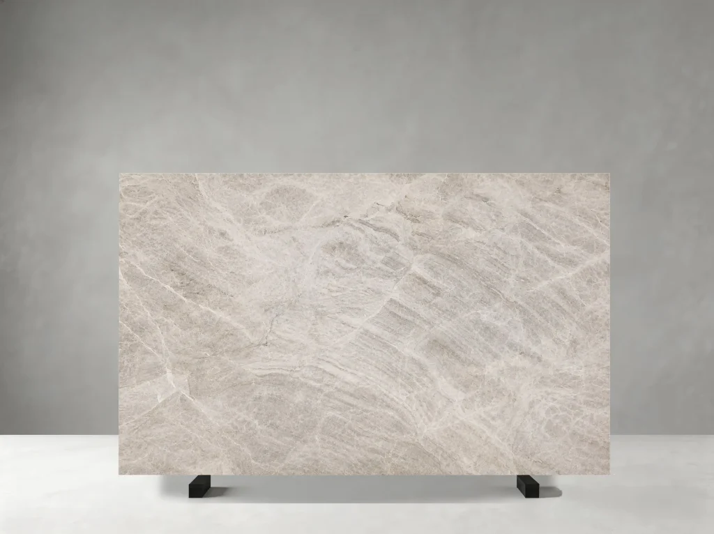 Close-up of Beige Taj Mahal Quartzite with ivory tones and layered crystalline veining