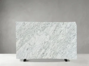 Bianco Ondulare Marble slab with white background and dense diagonal grey veins