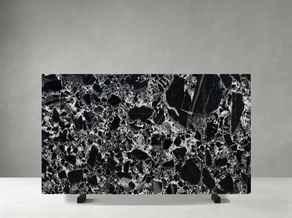 black noir grand antique marble slab with black base and white breccia stone fragments