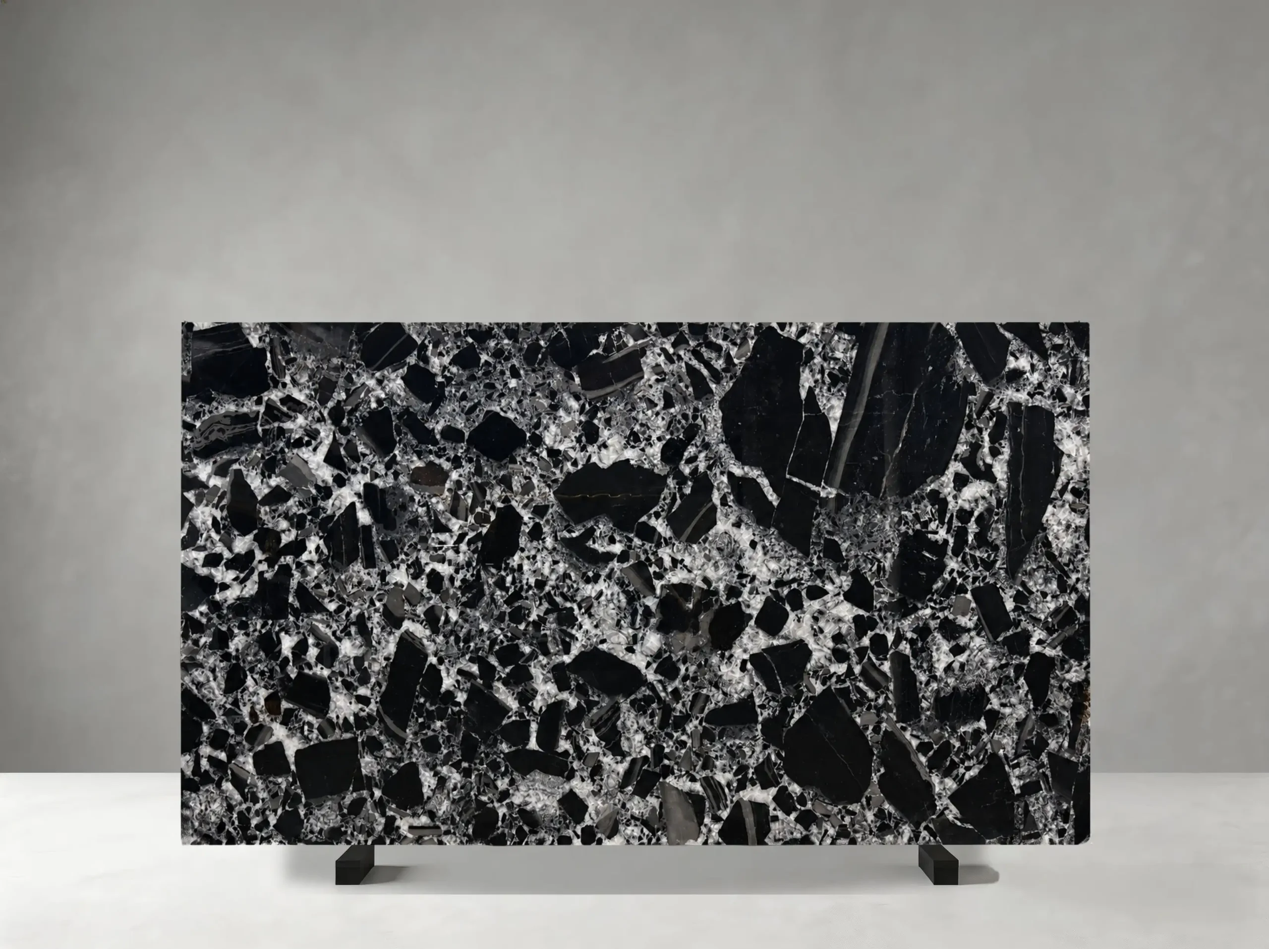 black-noir-grand-antique-marble-slab-black-white-breccia-04.webp black noir grand antique marble slab with black base and white breccia stone fragments