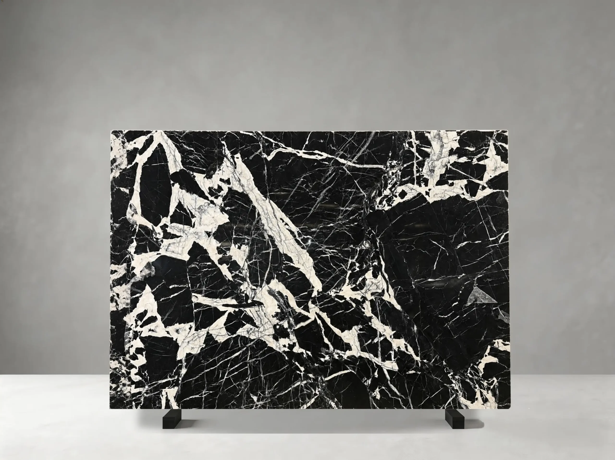 black-petit-antique-marble-slab-black-white-veining-04.webp black petit antique marble slab with deep black base and white breccia veining