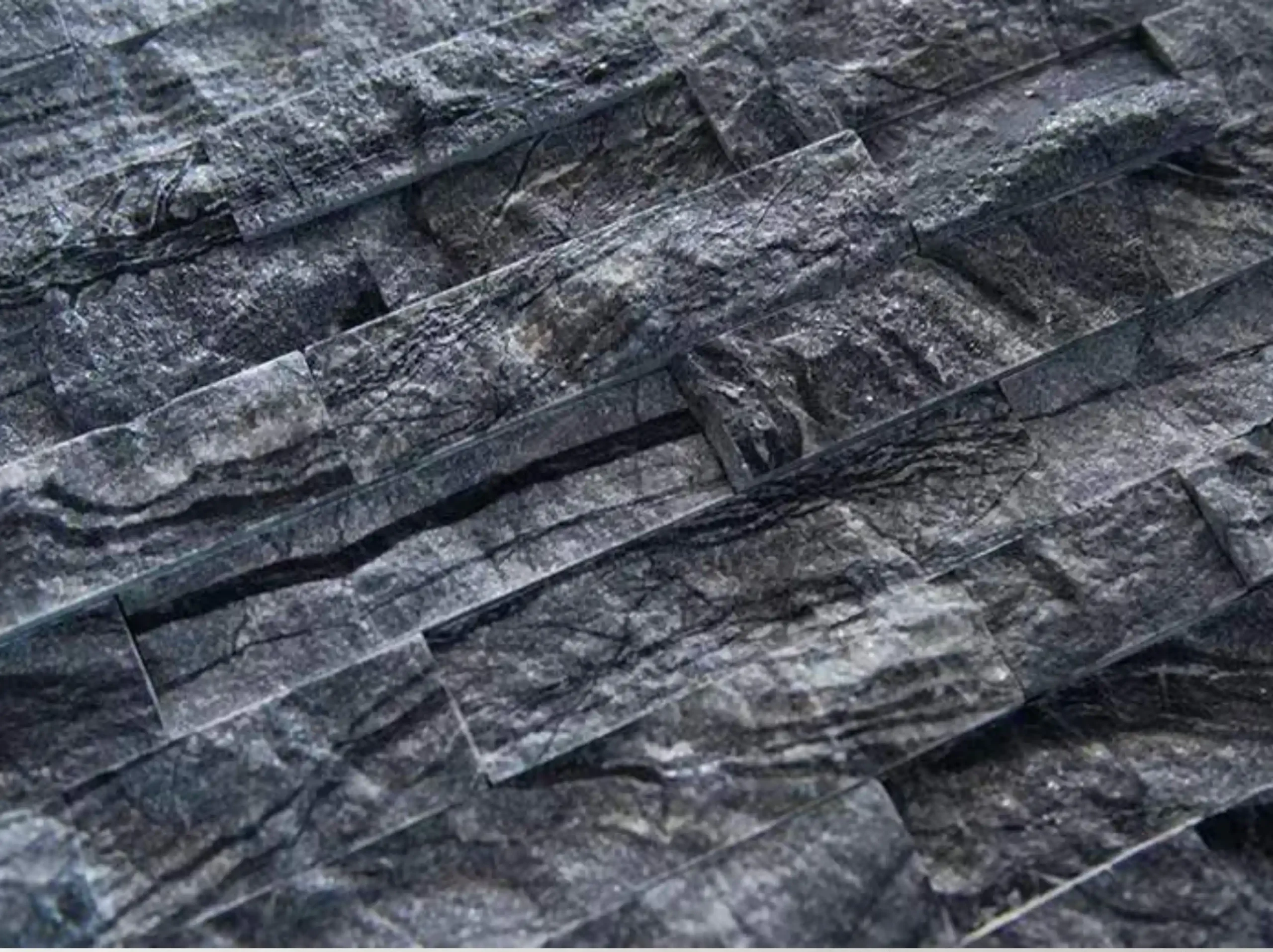 black-wooden-marble-split-face-wall-cladding-03.webp Black Wooden Marble split-face wall cladding strips