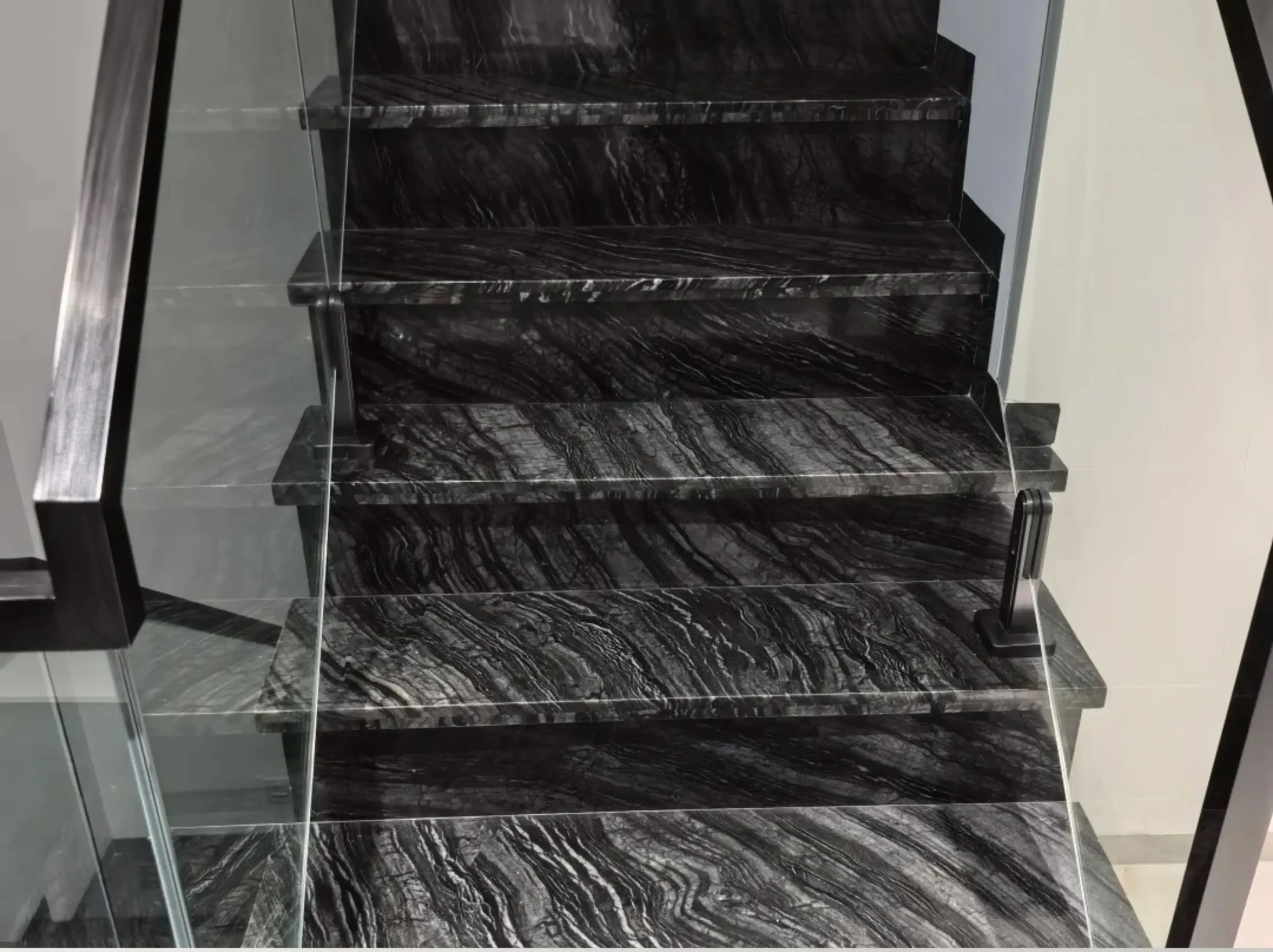 black-wooden-marble-staircase-steps-02.webp Black Wooden Marble staircase with polished treads and risers