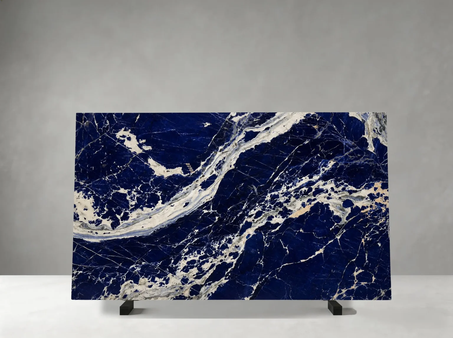 blue namibian sodalite granite slab with deep navy blue and sweeping white veining