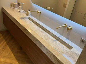 Custom Brazilian Matira Quartzite tabletop with light greige crystalline surface