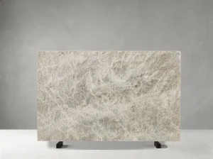 Front view of Brazilian Perla Venata Quartzite slab with pearl-grey and ivory crystalline movement