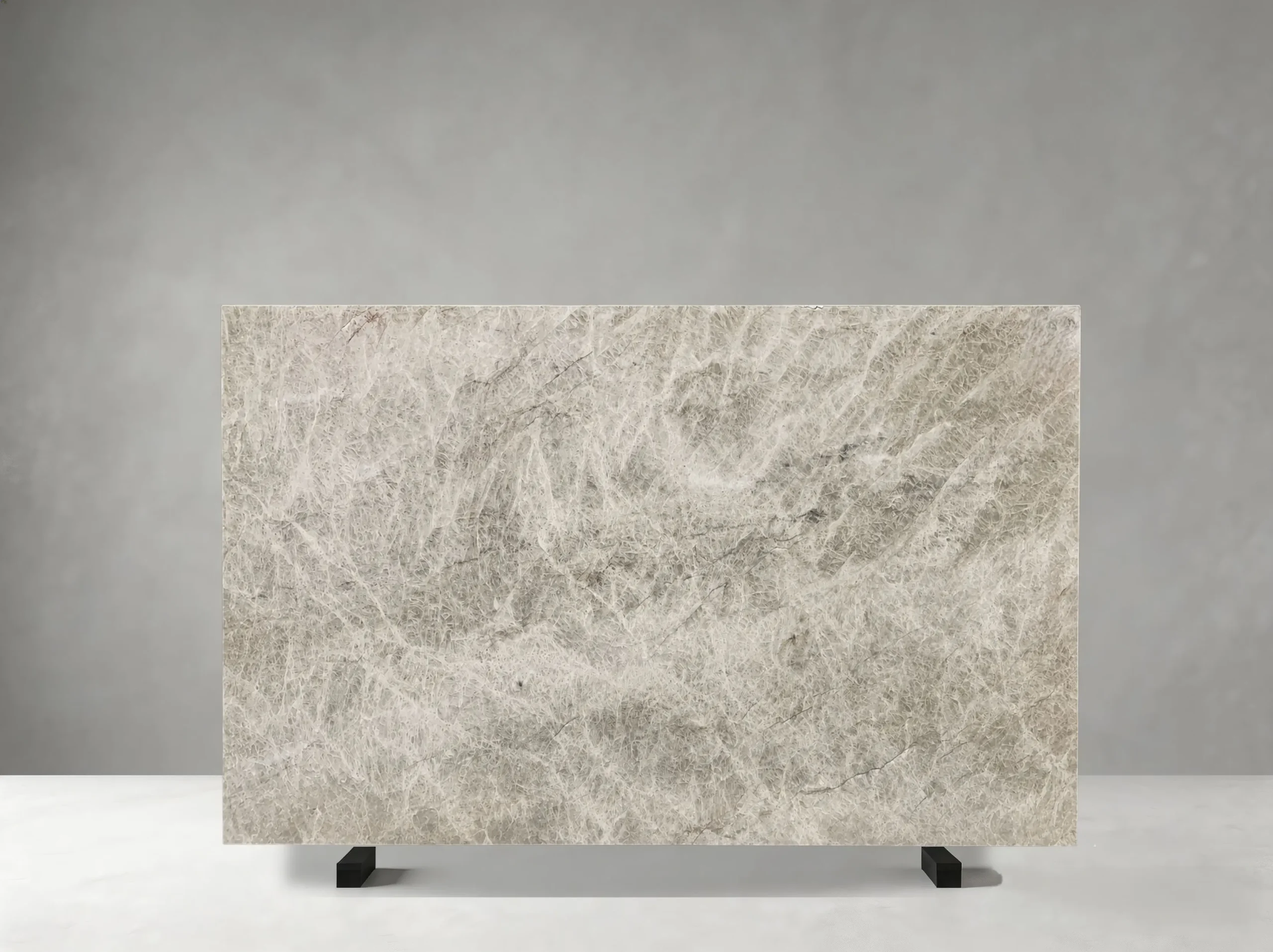 brazilian-perla-venata-quartzite-natural-slab.webp Front view of Brazilian Perla Venata Quartzite slab with pearl-grey and ivory crystalline movement