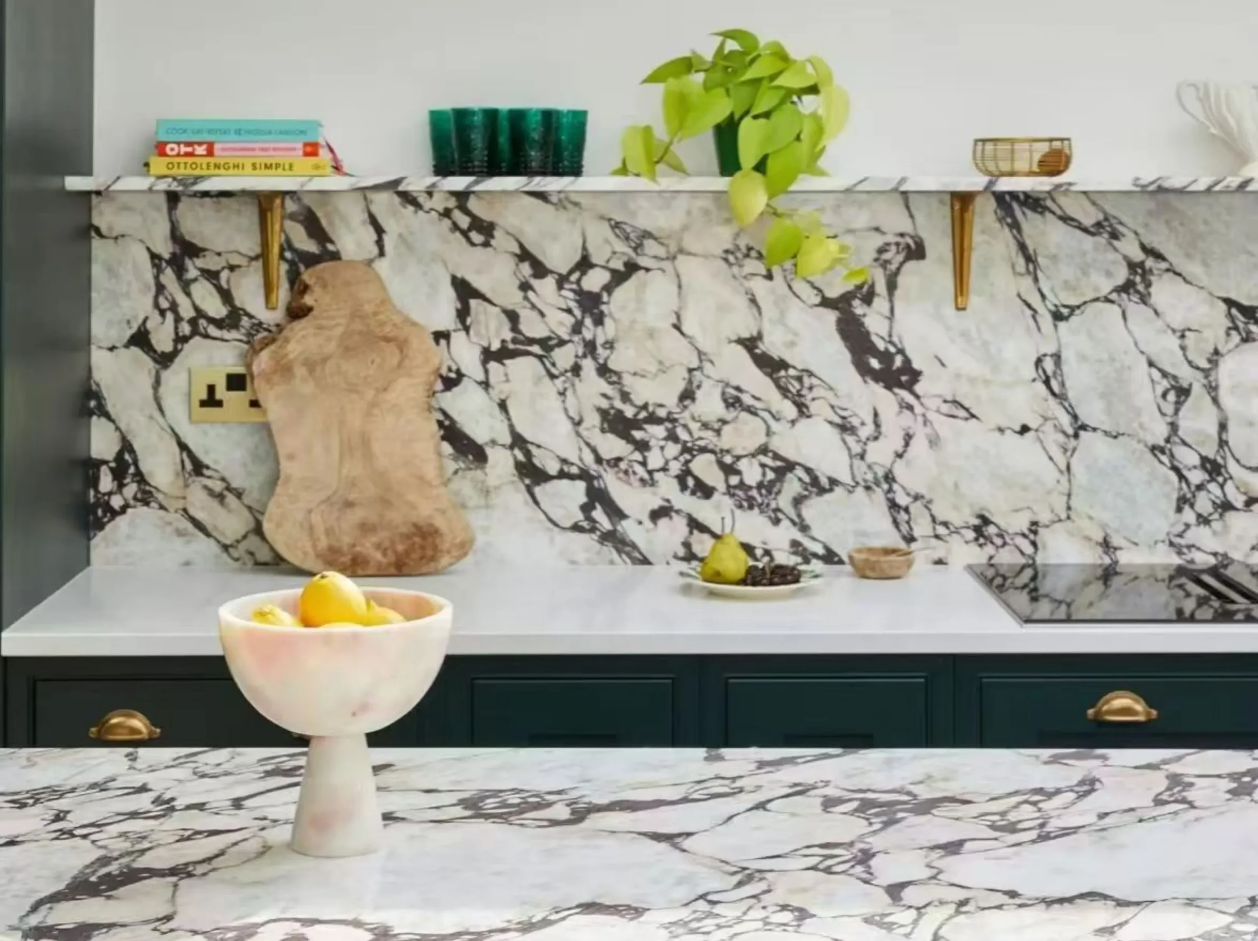 breccia-capraia-viola-marble-kitchen-backsplash-counter-03.webp breccia capraia viola marble kitchen backsplash and countertop with dark breccia veins
