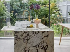 breccia capraia viola marble kitchen island top with cream base and dark viola veins