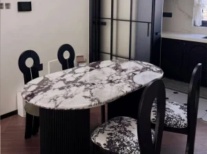 breccia capraia viola marble oval dining table with dramatic breccia pattern