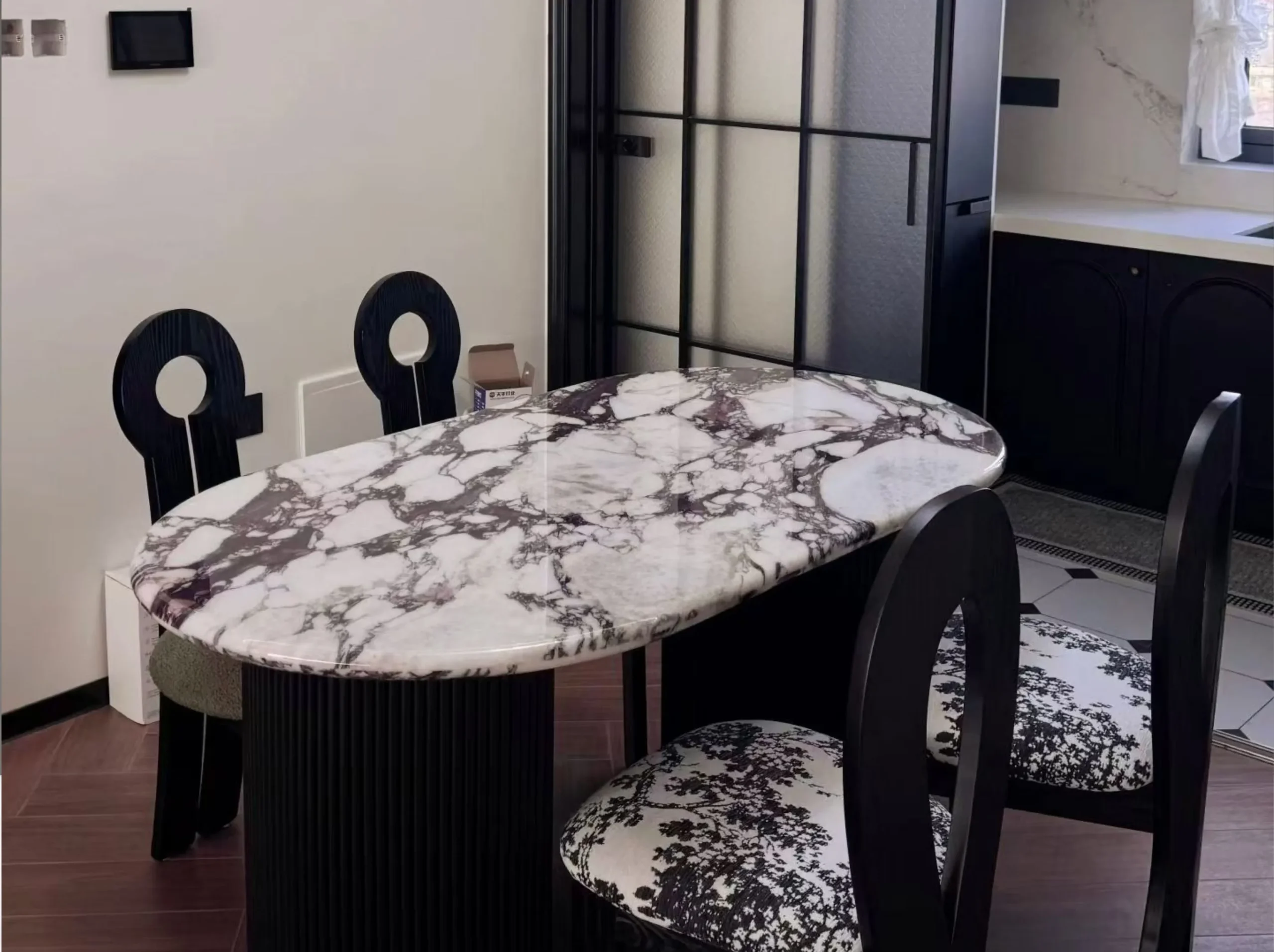 breccia-capraia-viola-marble-oval-dining-table-02.webp breccia capraia viola marble oval dining table with dramatic breccia pattern