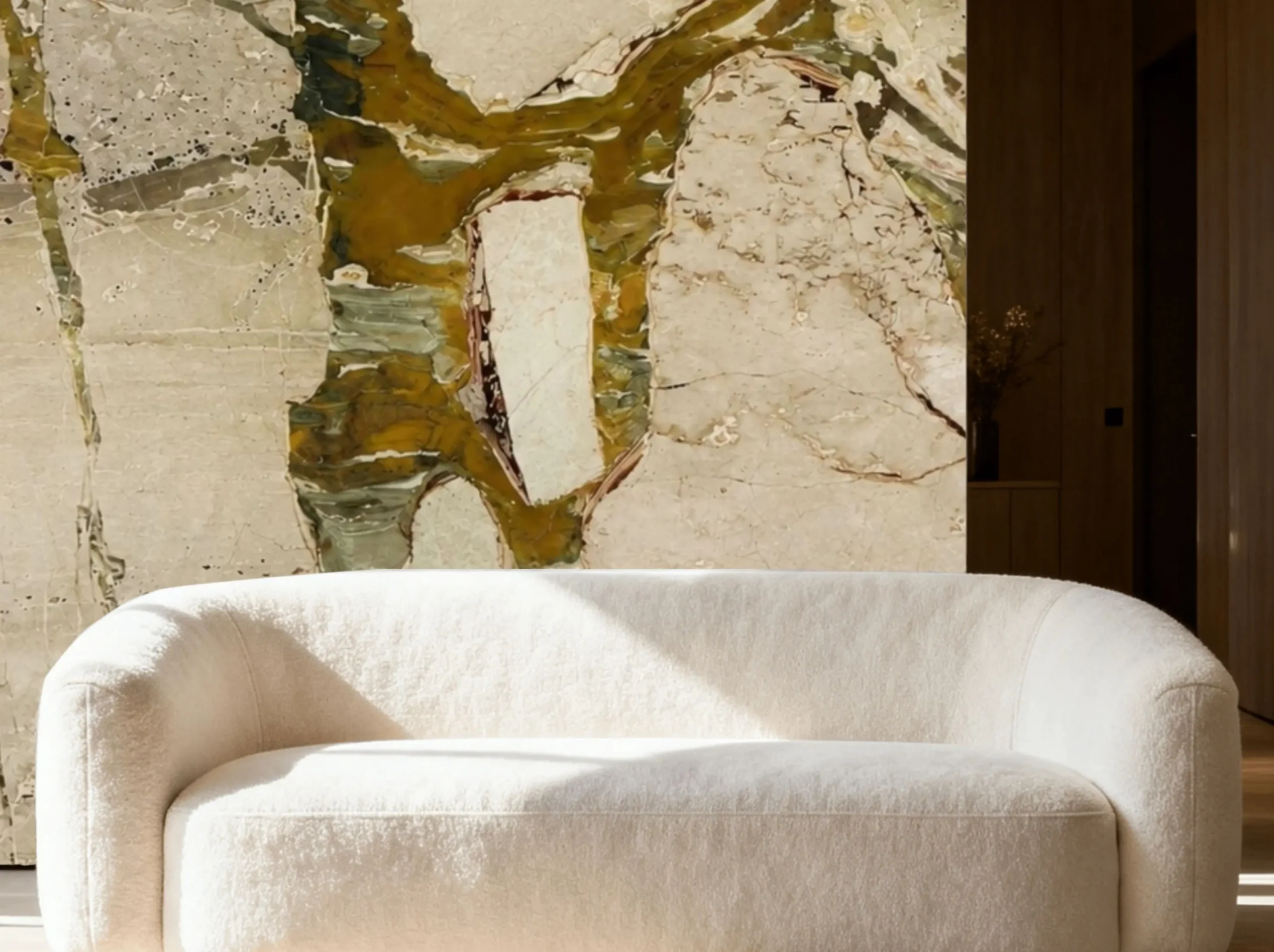 breccia-romana-marble-sofa-feature-wall.webp Breccia Romana Marble sofa feature wall with cream and olive-green patterns