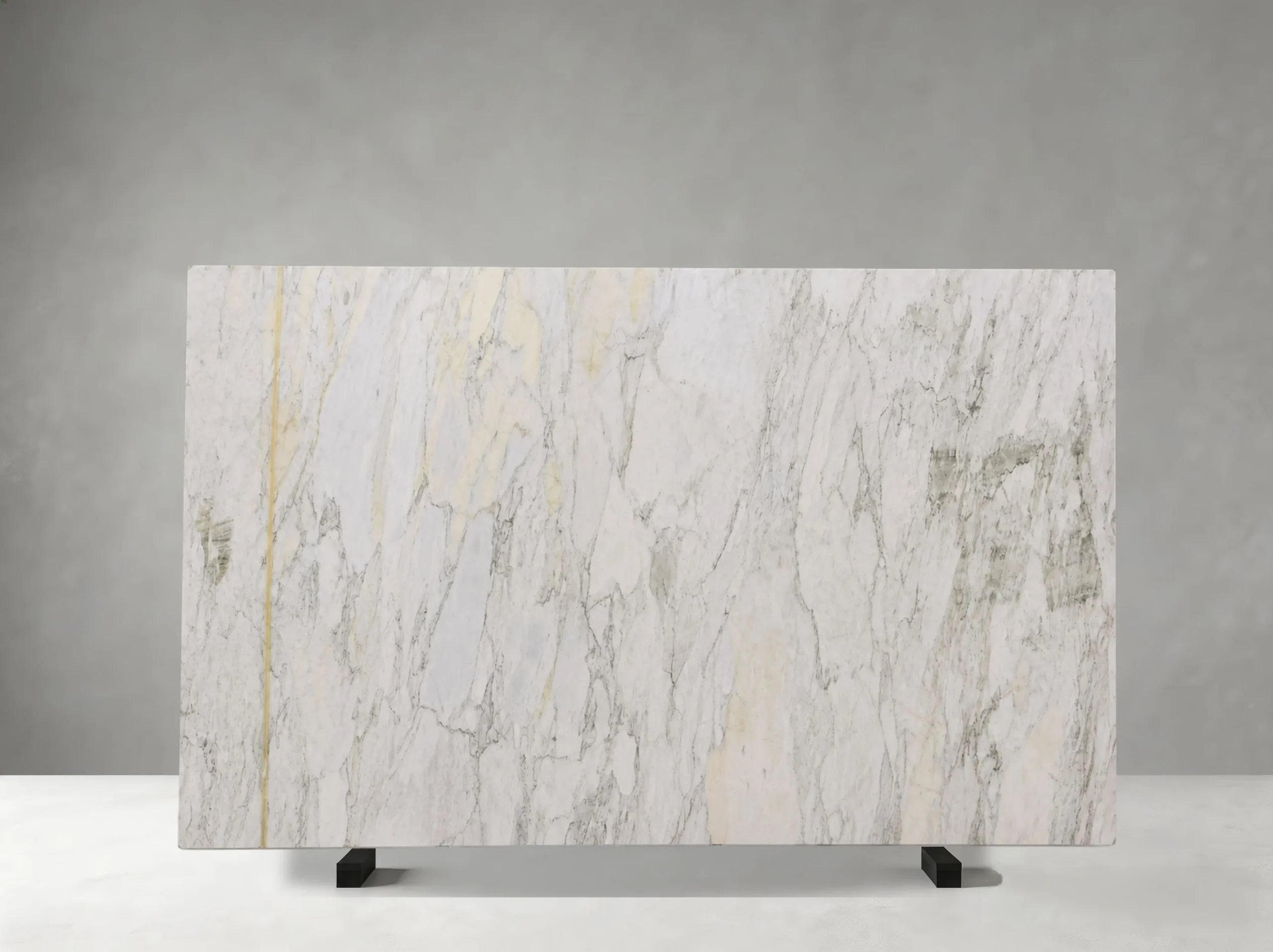 bvlgari-green-marble-full-slab-02.webp Bvlgari Green Marble full slab with delicate green veins and warm mineral accents