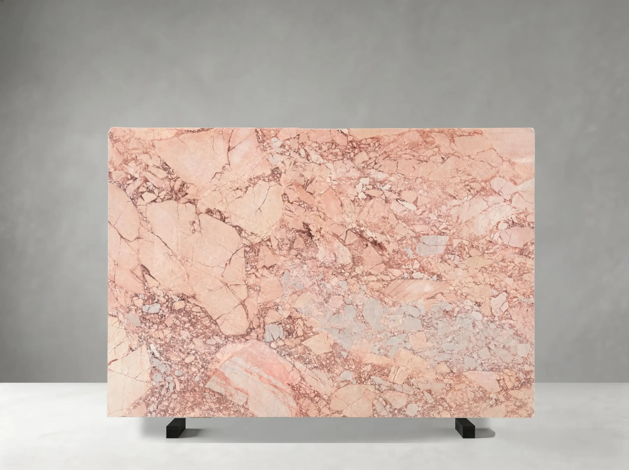 bvlgari-pink-marble-full-slab-01.webp Bvlgari Pink Marble full slab with light pink tones, rose veining and dense brecciated fragments