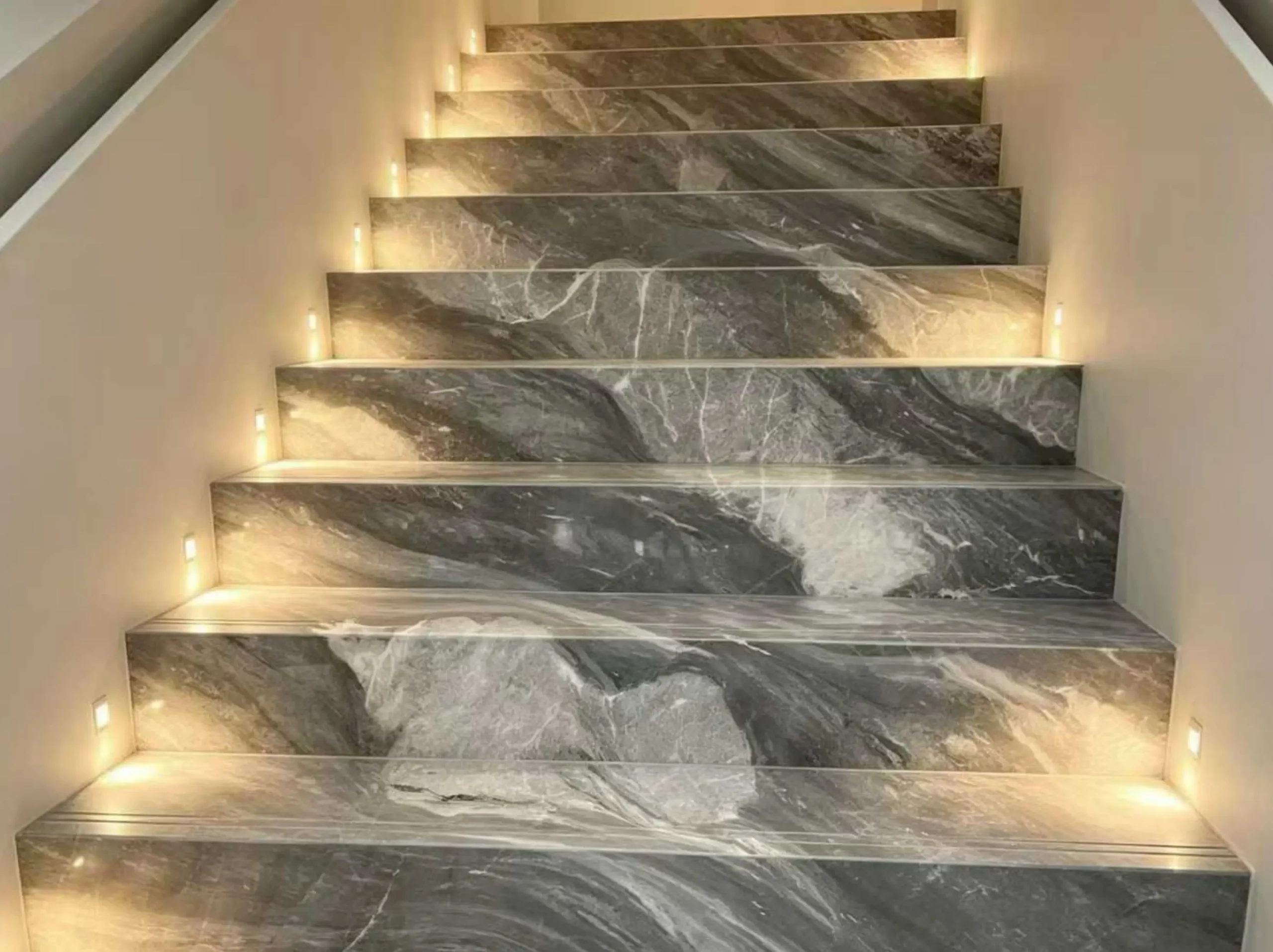 florence-gray-marble-illuminated-staircase-01.webp Florence Gray Marble staircase with integrated step lighting
