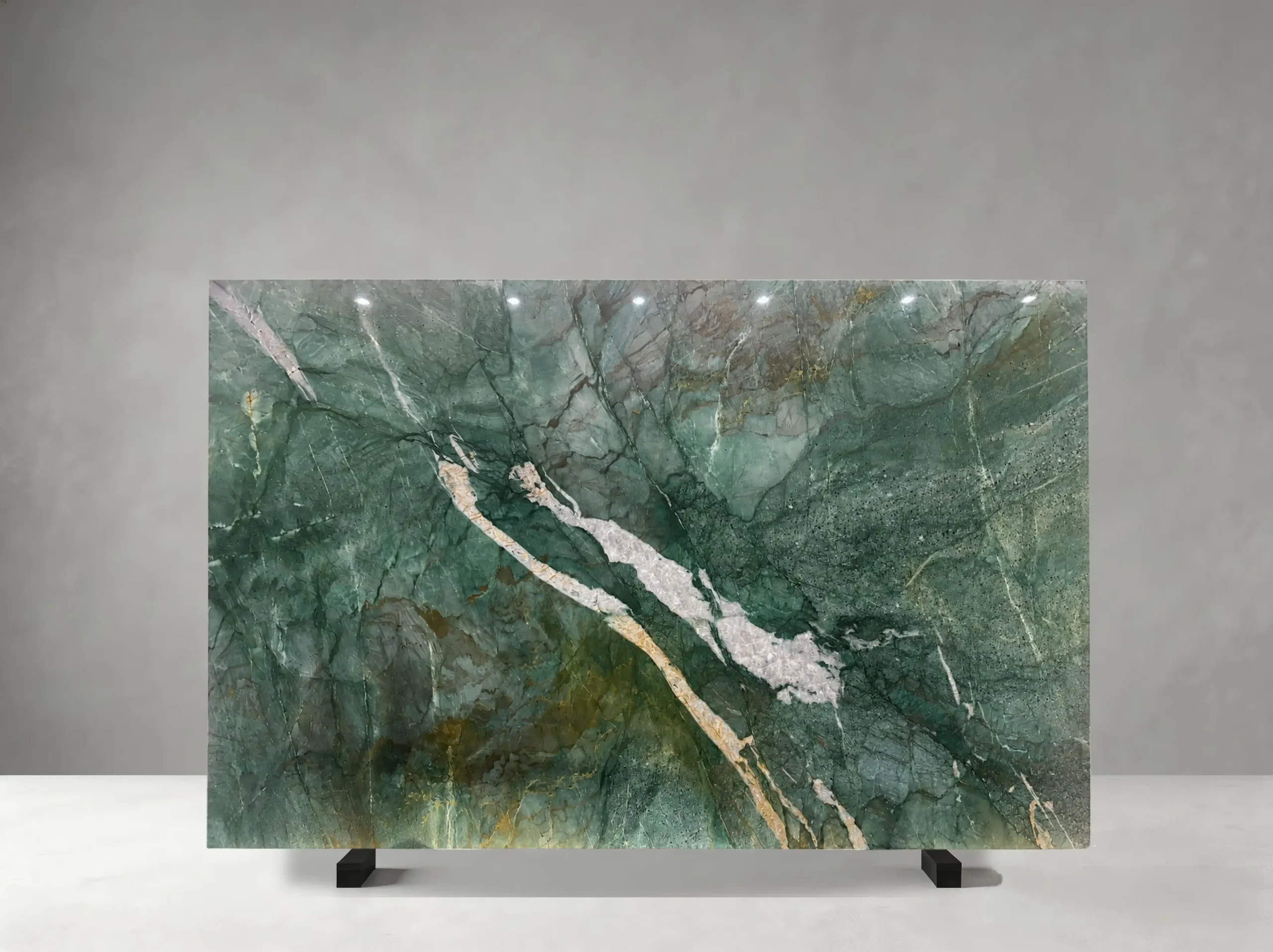 fuchsite-crystal-quartzite-full-slab-01.webp Dark green Fuchsite Crystal Quartzite slab with white crystal veins and golden-brown mineral patterns