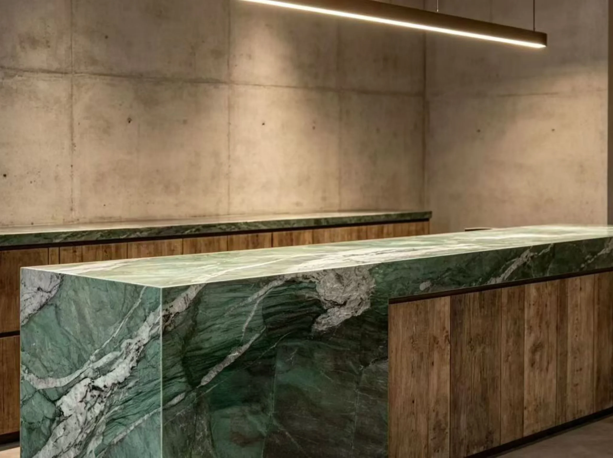 fuchsite-crystal-quartzite-kitchen-island.webp Fuchsite Crystal Quartzite kitchen island with waterfall sides and matching countertop