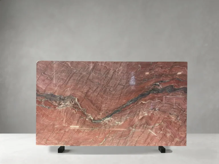 Fusion Fire Quartzite slab with red background and diagonal charcoal vein